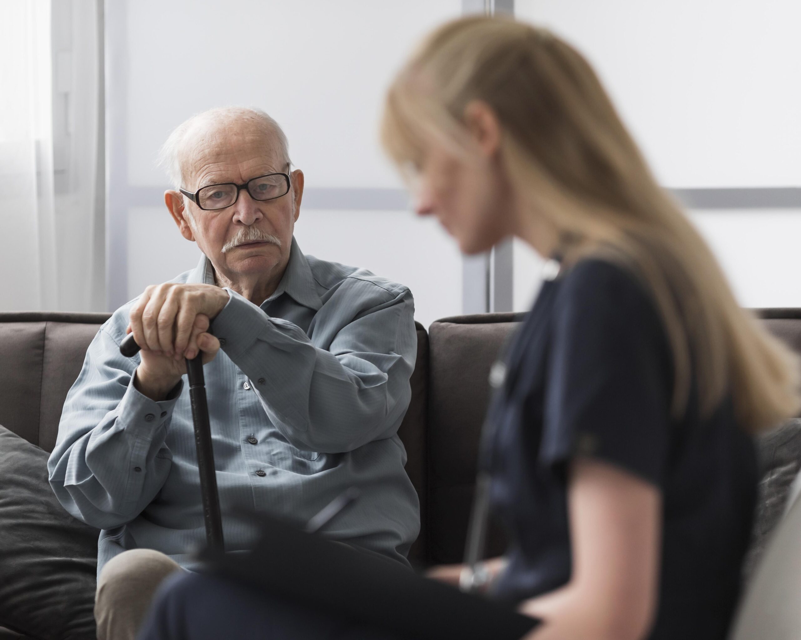 old-man-being-consulted-by-nurse old-man-being-consulted-by-nurse